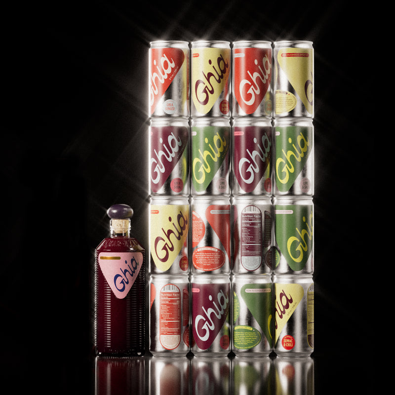 A Ghia non-alcoholic Berry Apéritif set and non-alcoholic spritz cans in yellow, orange, green, and berry hues that represent the 4 flavors (Ghia-Soda, Ghia-Ginger, Lime & Salt, Sumac & Chili)